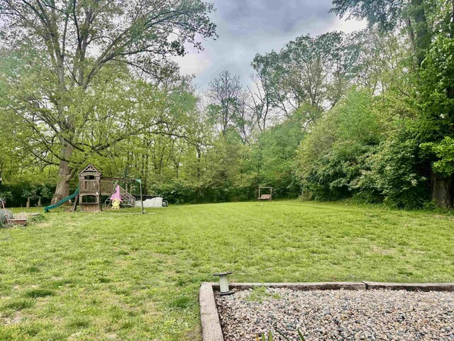 4203 Logansport Rd, Logansport, IN 46947 - view of green lawn with a playground