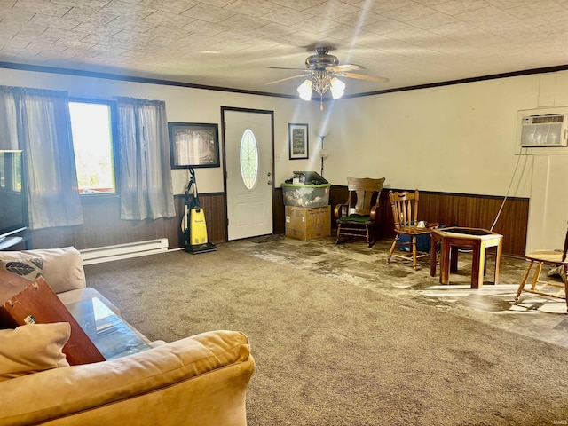 4203 Logansport Rd, Logansport, IN 46947 - living area with a baseboard heating unit, carpet flooring, wooden walls, a wainscoted wall, and ceiling fan