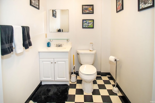 509 Mount Ashley Rd, Evansville, IN 47711 - half bathroom with tile patterned floors, toilet, and vanity