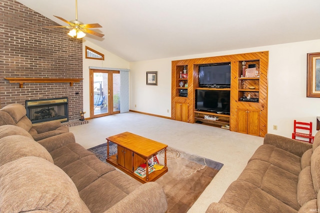 509 Mount Ashley Rd, Evansville, IN 47711 - living area with vaulted ceiling, carpet flooring, a ceiling fan, a fireplace, and baseboards