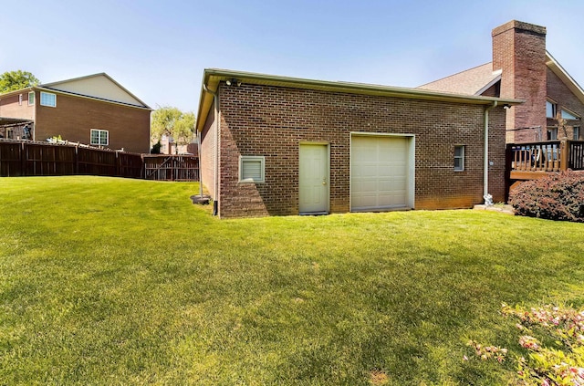 509 Mount Ashley Rd, Evansville, IN 47711 - back of property with brick siding, a deck, and a chimney