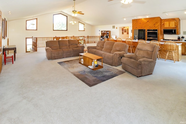 509 Mount Ashley Rd, Evansville, IN 47711 - living room featuring a ceiling fan, track lighting, carpet flooring, and vaulted ceiling