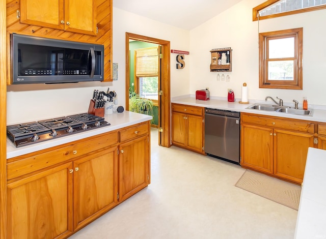 509 Mount Ashley Rd, Evansville, IN 47711 - kitchen featuring stainless steel appliances, a sink, light countertops, and brown cabinets