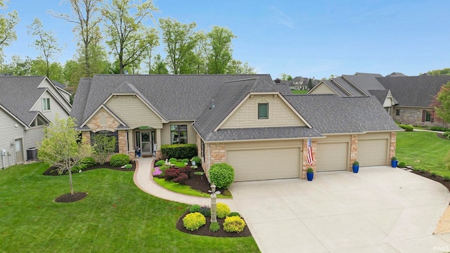 craftsman house with a garage, stone siding, concrete driveway, a front yard, and a residential view