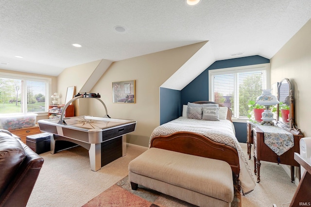 bedroom featuring carpet floors, lofted ceiling, multiple windows, a textured ceiling, and recessed lighting