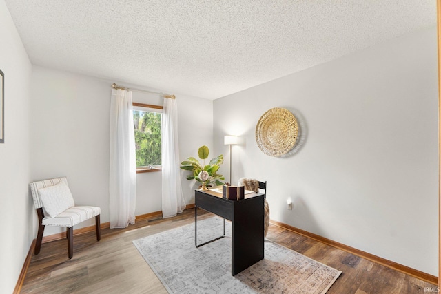 6114 Picacho Dr, Fort Wayne, IN 46825 - office space featuring wood finished floors, a textured ceiling, and baseboards