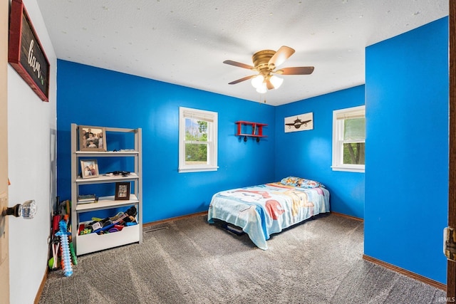 260 N 850 W-92 Rd, Pierceton, IN 46562 - carpeted bedroom with ceiling fan and baseboards