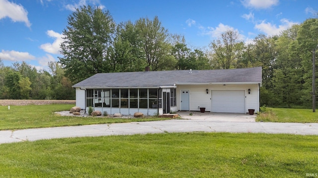 260 N 850 W-92 Rd, Pierceton, IN 46562 - ranch-style house with a garage, a sunroom, concrete driveway, and a front yard