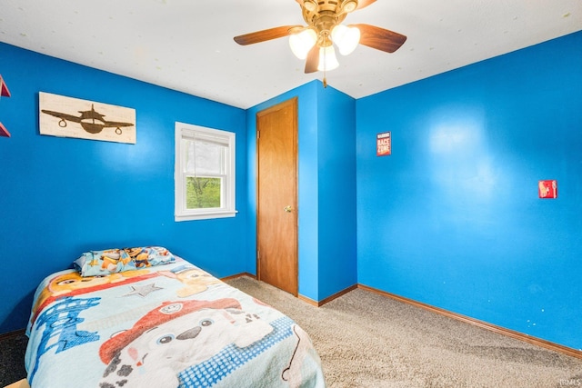 260 N 850 W-92 Rd, Pierceton, IN 46562 - carpeted bedroom featuring baseboards and a ceiling fan