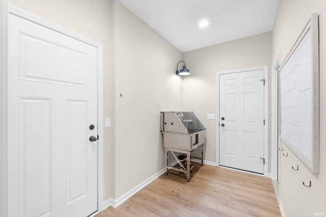 1004 Hathaway Rd, Fort Wayne, IN 46845 - entryway with light wood-style floors and baseboards