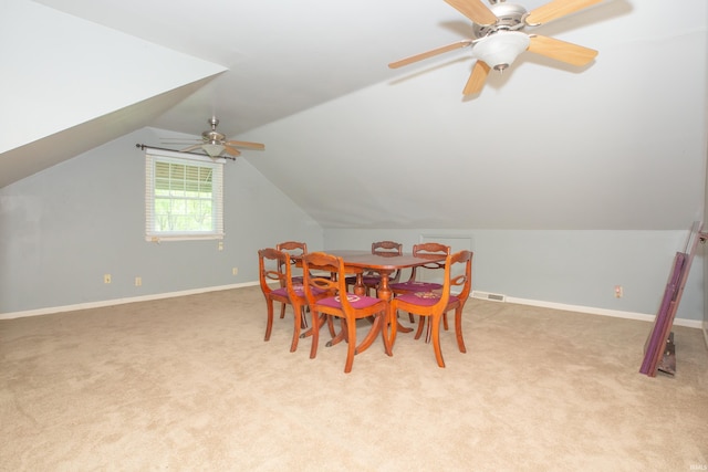 300 Springhaven Dr, Evansville, IN 47710 - dining room featuring carpet, ceiling fan, vaulted ceiling, and baseboards