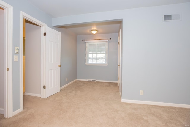300 Springhaven Dr, Evansville, IN 47710 - unfurnished room featuring light colored carpet and baseboards
