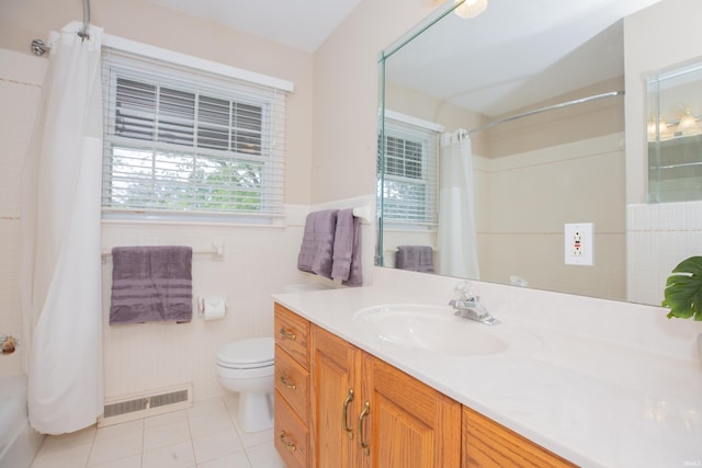 300 Springhaven Dr, Evansville, IN 47710 - bathroom featuring tile patterned flooring, a shower with curtain, toilet, vanity, and tile walls