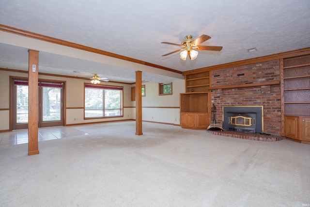 300 Springhaven Dr, Evansville, IN 47710 - unfurnished living room with a wood stove, baseboards, light carpet, ceiling fan, and crown molding