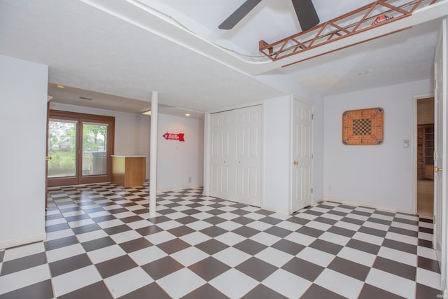 300 Springhaven Dr, Evansville, IN 47710 - below grade area featuring tile patterned floors, baseboards, a ceiling fan, and recessed lighting