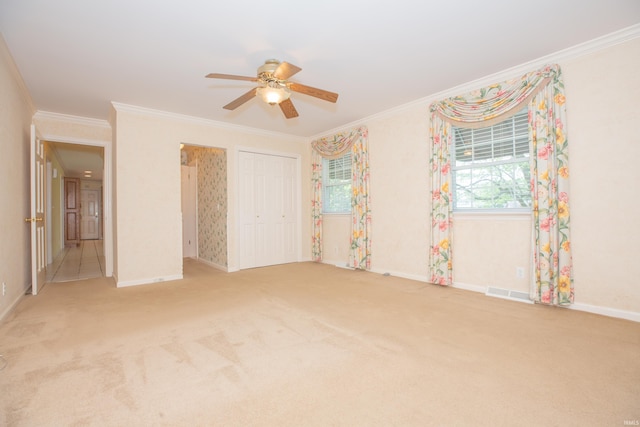 300 Springhaven Dr, Evansville, IN 47710 - unfurnished bedroom featuring ornamental molding, carpet floors, baseboards, a closet, and a ceiling fan