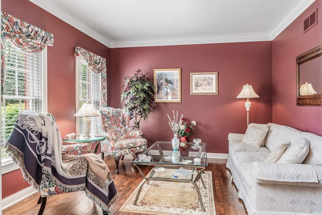 10528 Indian Ridge Dr, Fort Wayne, IN 46814 - living area featuring crown molding, wood finished floors, and baseboards