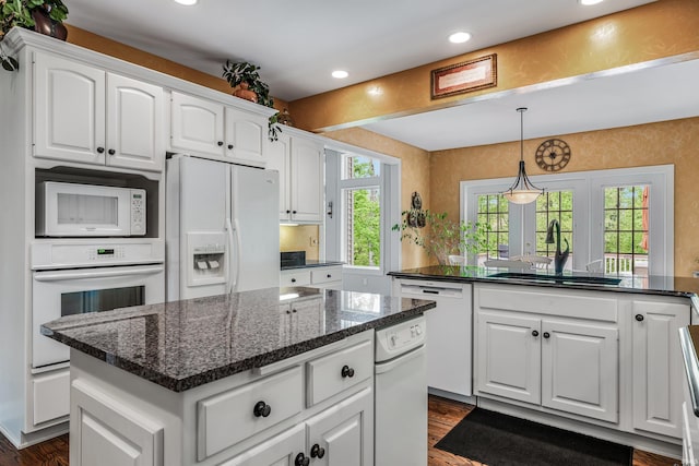 10528 Indian Ridge Dr, Fort Wayne, IN 46814 - kitchen with white appliances, a sink, dark wood-type flooring, recessed lighting, and white cabinets