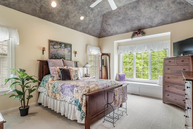 10528 Indian Ridge Dr, Fort Wayne, IN 46814 - bedroom with light carpet, vaulted ceiling, a ceiling fan, and baseboards