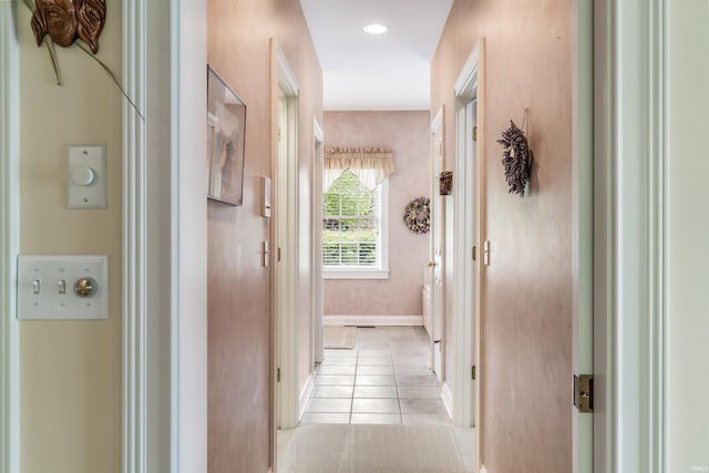 10528 Indian Ridge Dr, Fort Wayne, IN 46814 - corridor featuring light tile patterned floors, baseboards, and recessed lighting
