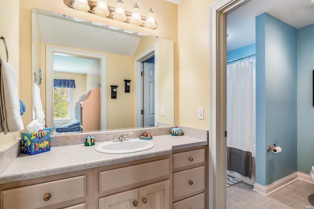 10528 Indian Ridge Dr, Fort Wayne, IN 46814 - bathroom featuring vanity, tile patterned flooring, toilet, and baseboards
