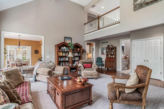 10528 Indian Ridge Dr, Fort Wayne, IN 46814 - living room featuring high vaulted ceiling, wood finished floors, baseboards, and beamed ceiling