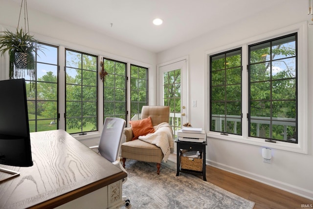 home office with baseboards, wood finished floors, and recessed lighting