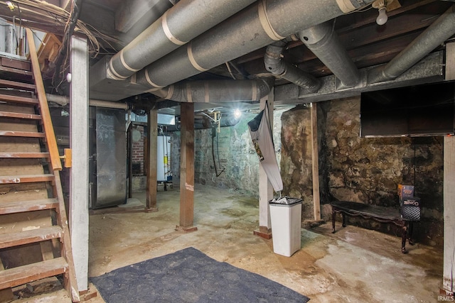 213 E Fourth St, Milford, IN 46542 - unfinished below grade area with gas water heater and stairway