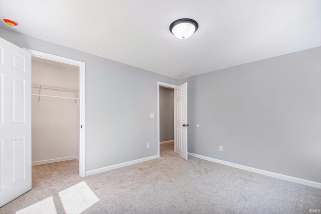 10059 Jefferson Rd, Osceola, IN 46561 - unfurnished bedroom featuring carpet, baseboards, a spacious closet, and a closet