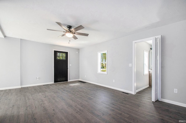 10059 Jefferson Rd, Osceola, IN 46561 - unfurnished room featuring ceiling fan, dark wood-style floors, and baseboards