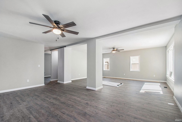 10059 Jefferson Rd, Osceola, IN 46561 - unfurnished living room featuring ceiling fan, wood finished floors, and baseboards