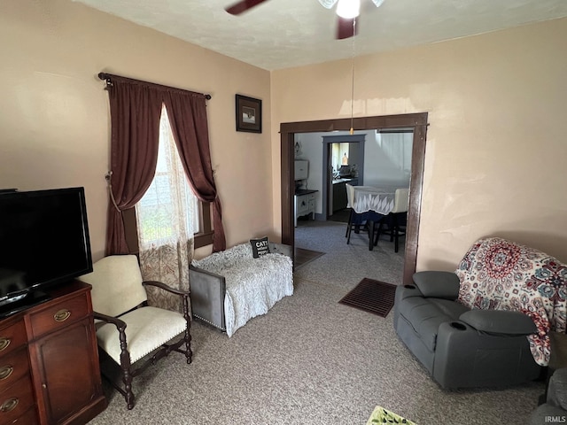 907 S 21st St, Lafayette, IN 47905 - living room with light carpet and ceiling fan