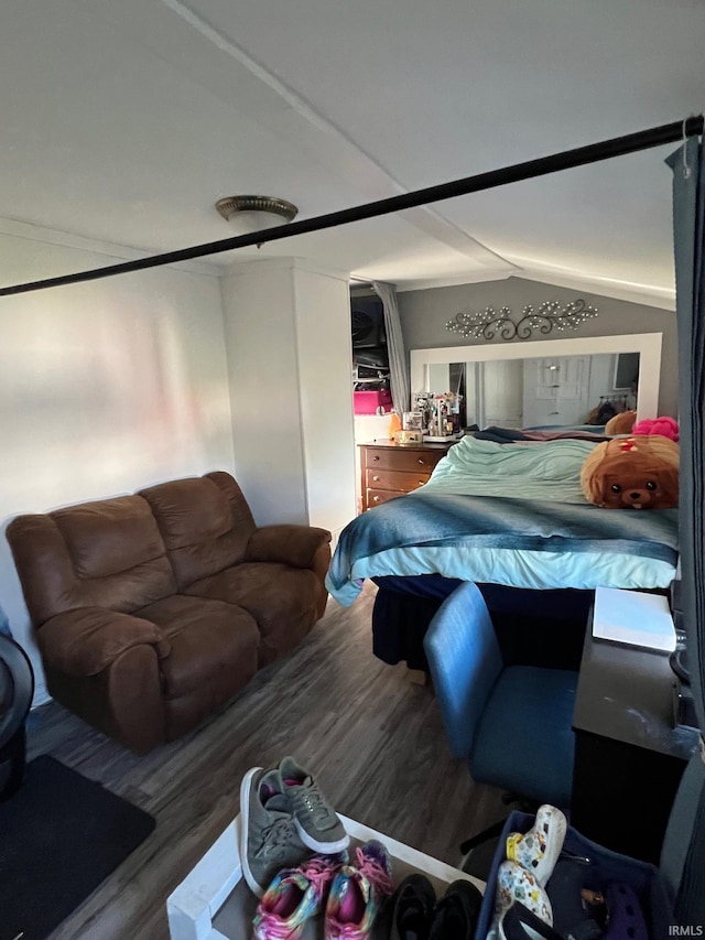 907 S 21st St, Lafayette, IN 47905 - bedroom with wood finished floors and vaulted ceiling