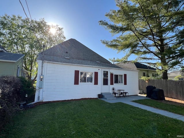 907 S 21st St, Lafayette, IN 47905 - rear view of house with entry steps, a shingled roof, and a patio