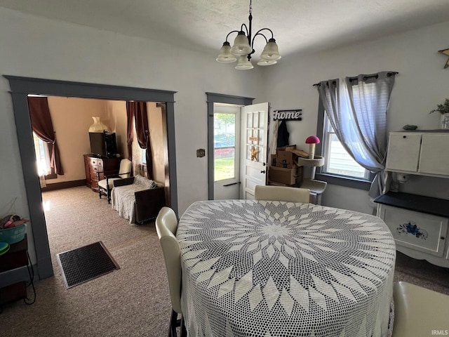 907 S 21st St, Lafayette, IN 47905 - carpeted bedroom with a chandelier