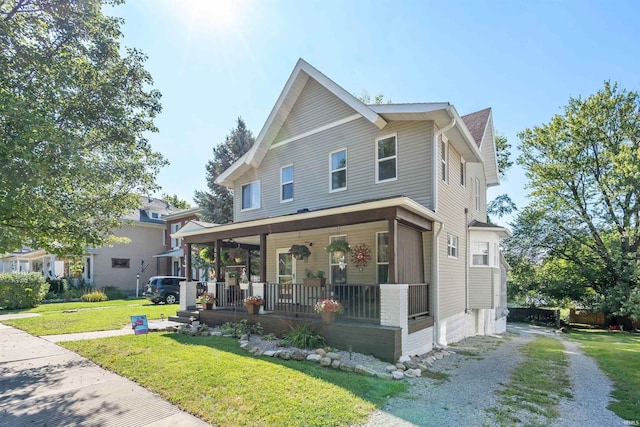 601 W Sycamore St, Kokomo, IN 46901 - view of front of home featuring a porch and a front lawn