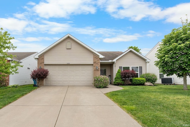 ranch-style home with brick siding, a garage, driveway, a front yard, and central air condition unit