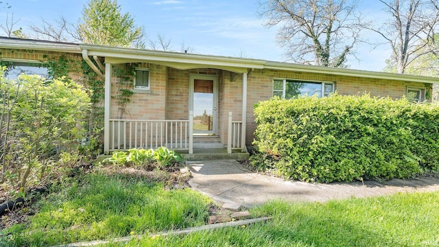 800 E 900 N, Decatur, IN 46733 - view of front of property with brick siding and a porch