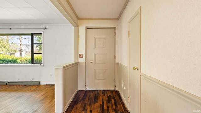 800 E 900 N, Decatur, IN 46733 - doorway with wood finished floors, crown molding, and a baseboard radiator