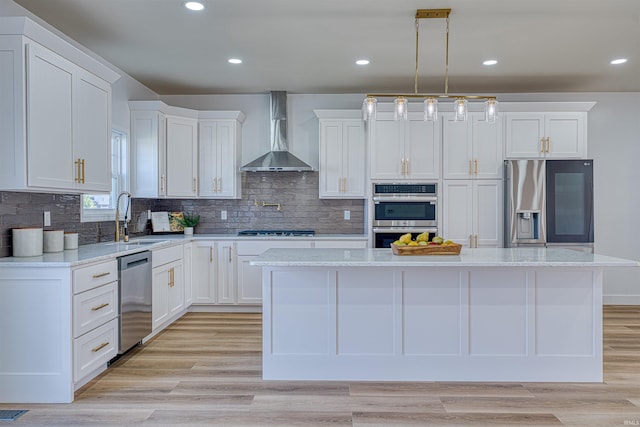 3530 Montgomery Ct, Newburgh, IN 47630 - kitchen with wall chimney exhaust hood, appliances with stainless steel finishes, a sink, white cabinetry, and backsplash