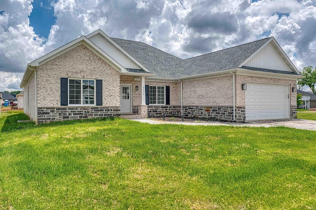 3530 Montgomery Ct, Newburgh, IN 47630 - view of front of house with an attached garage, brick siding, driveway, and a front lawn