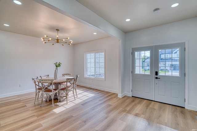 3530 Montgomery Ct, Newburgh, IN 47630 - dining room featuring a chandelier, light wood finished floors, baseboards, and recessed lighting