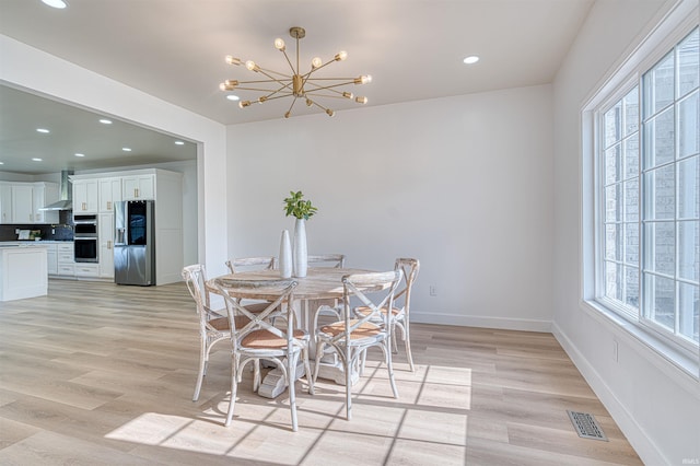 3530 Montgomery Ct, Newburgh, IN 47630 - dining room with light wood-style floors, a chandelier, recessed lighting, and baseboards