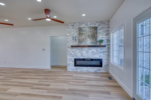 3530 Montgomery Ct, Newburgh, IN 47630 - unfurnished living room with ceiling fan, healthy amount of natural light, a fireplace, wood finished floors, and recessed lighting