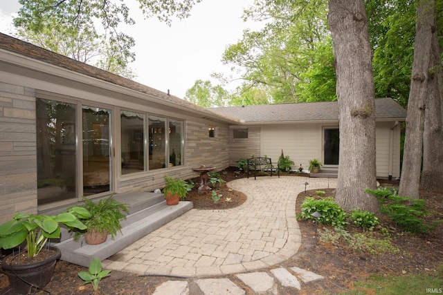 back of house with a patio area