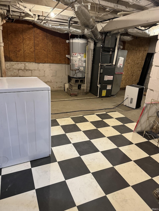 217 E Eichel Ave, Evansville, IN 47711 - unfinished basement featuring gas water heater, washer / dryer, tile patterned floors, and heating unit