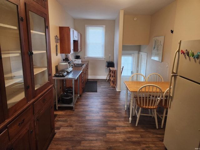 217 E Eichel Ave, Evansville, IN 47711 - dining area featuring dark wood-type flooring and baseboards