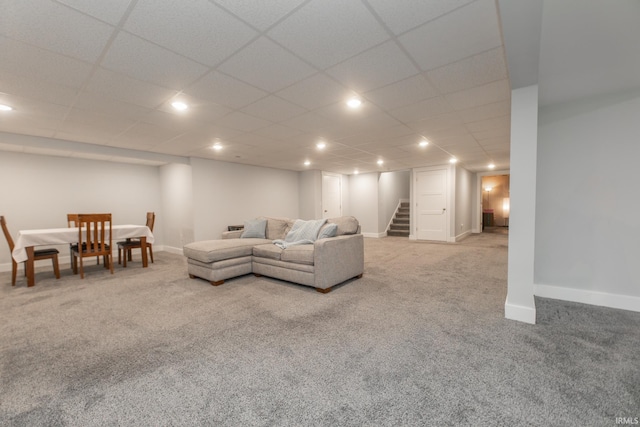 735 E Holland Dr, Bloomington, IN 47401 - living room with carpet floors, stairway, baseboards, and recessed lighting