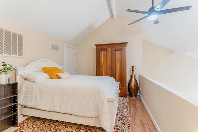 bedroom with light wood-type flooring, baseboards, and a ceiling fan