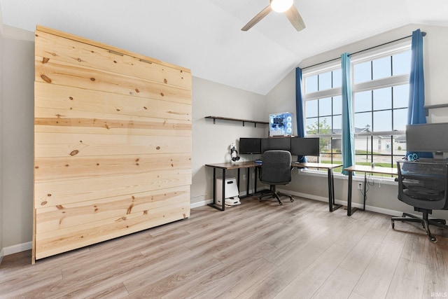 7689 Accio Cv, Fort Wayne, IN 46835 - home office with vaulted ceiling, wood finished floors, a ceiling fan, and baseboards